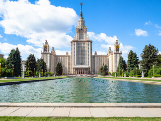 Main Building of Moscow University with pool on University Square from north. The inscription above the portal 1949-1953 Moscow State University named after MV Lomonosov