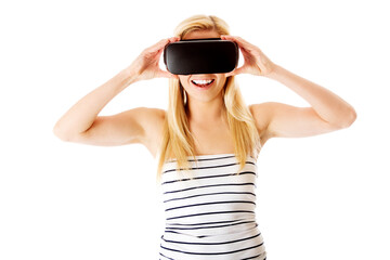 Woman with VR headset glasses device. Communication and look by virtual reality concept.