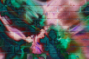 Brick wall. Abstract beautiful street art colorful graffiti style closeup. Iconic urban culture youth