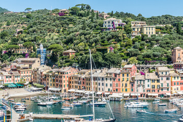 Aerial view of Portofino with many colorful houses and boats