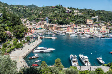 Fototapeta na wymiar Aerial view of Portofino with many colorful houses and boats