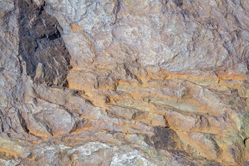 Original textured surface of of a natural coarse stone