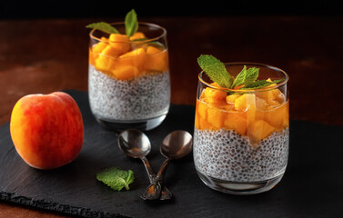 Vegan healthy food. Chia pudding with coconut milk, fresh peaches and honey