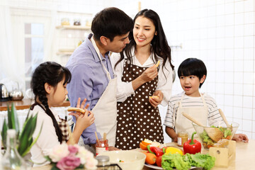 Happiness young family and children at kitchen in holiday weekend.