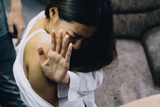 Asian women being raped With raped men holding standing Wearing jeans After raped the woman