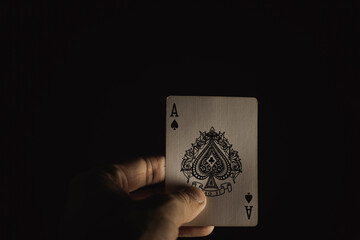 playing cards in hand