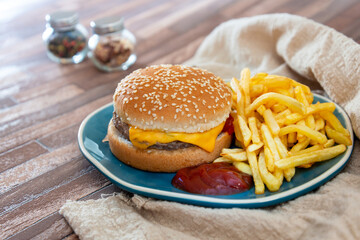 American cheese burger with Golden French fries