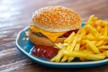 American cheese burger with Golden French fries