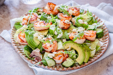 Salad with shrimps, avocado and cucumber