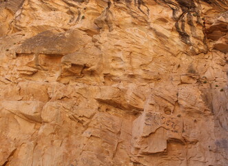 background texture of a sandstone rock wall