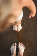 child runs on the beach sunset