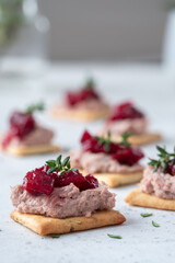 Rosemary Cracker with pate and cranberry sauce