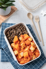 Tofu and sweet potato curry with lentils in lunch box