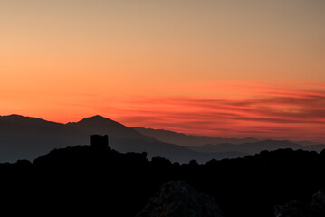 Sunrise on Lefkada silhouetting an old windmill