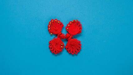Red ribbon on blue background