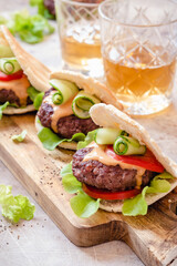 Homemade pita burgers with fresh vegetables