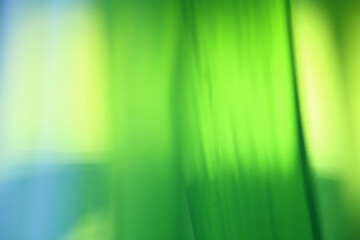 Abstract saturated green glass background.