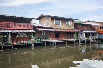 Traditional houses by the canal in Thailand