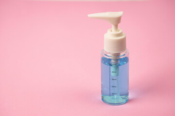 Hand sanitizer alcohol gel bottle pump rub clean hands hygiene prevention of virus , , Isolated on pink background