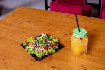 Seafood salad and juice on the table