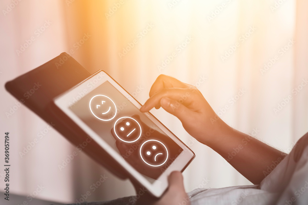 Poster woman hand touching on tablet computer to select infographic face for customer service and customer 