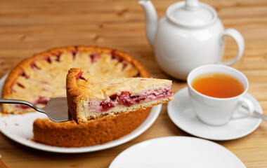 Closeup piece of homemade plum pie. Shallow focus.