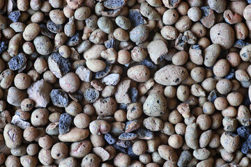 Close-up decorative stones in brown and gray colors. Background and texture.