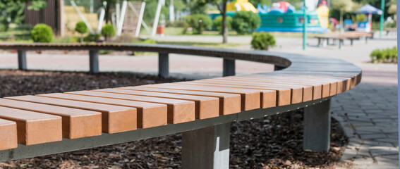 Fragment of a bench in the autumn Park