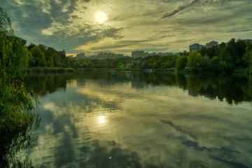 Autumn Sunset On The Lake Beautiful scenic view of the red sunset over a lake