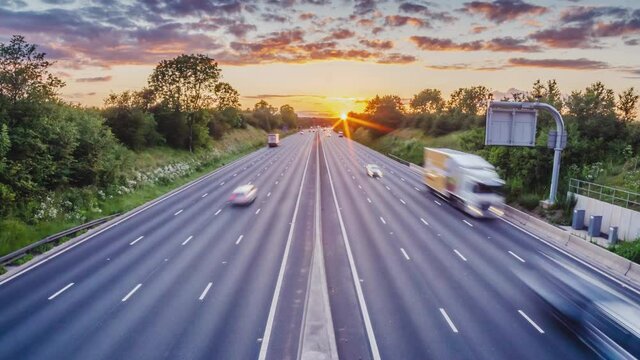 sunset traffic moving on uk motorway in england timelapse