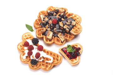 Freshly baked waffles with chocolate isolated on white background