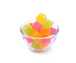 candy colorful sweets in bowl on white background