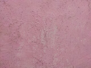 Abstract pink coloured wall with white patches and lines