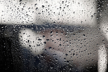 Drops of water perched on my window glass