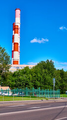 Heat station pipes in the industrial zone. color