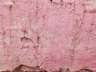 Abstract pink coloured wall with white patches and lines