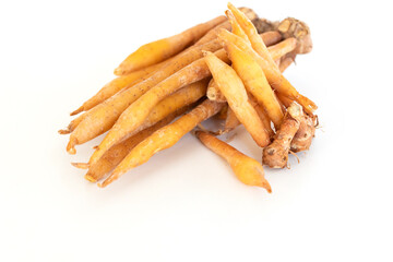 close up of Krachai or finger root an ingredient for seasoning and aromatic for Thai cooking, isolated on white background with copy space for text.