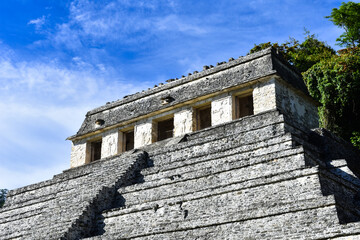 The Palenque pyramid with a great sky and clouds
