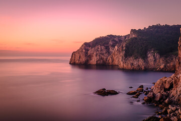 Beautiful sunrise at the Mediterranean Sea (the coastline of Costa Brava, Begur, Catalonia, Spain)