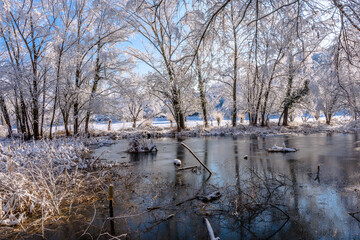 Winter landscape with frozen water