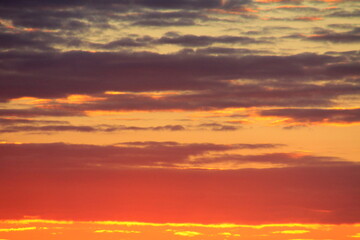 Fototapeta premium red clouds in the sky at sunset