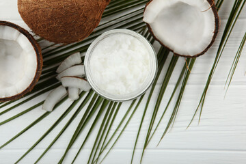 coconut oil and coconuts on the table
