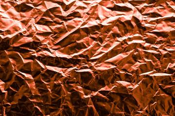 Shiny drak red foil texture background, red aluminium
