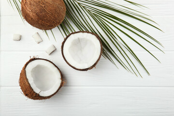 Fototapeta na wymiar broken coconut on a colored background. 