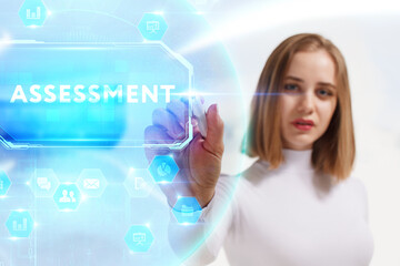 Business, Technology, Internet and network concept. Young businessman working on a virtual screen of the future and sees the inscription: Assessment