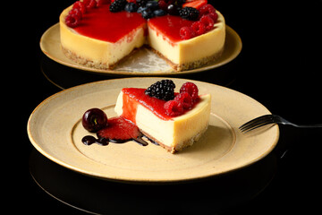 cheese pie with berries in a black background
