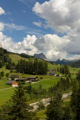 sunset on italian mountains with clouds