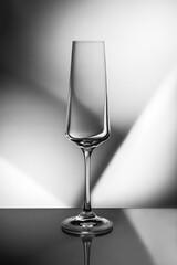 champagne glass on a black and white geometric background