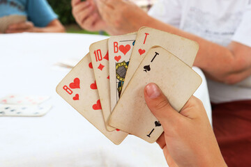 playing cards at their summer cottage