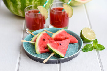 Fresh delicious watermelon sliced with mint and watermelon juice